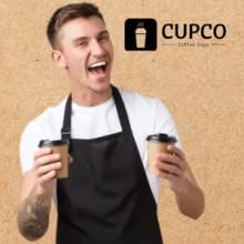 a man in an apron holding two cups and making a funny face with his mouth open