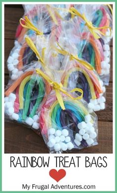 rainbow treat bags filled with candy and marshmallows