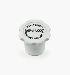 a white bottle stopper with the words rev - alot on it's side