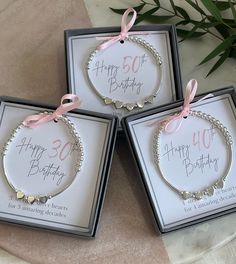 three personalized birthday bracelets with pink bows