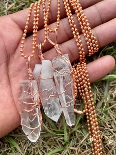 "LEMURIAN SEED CRYSTAL: Connection with the Divine Feminine/ Goddess energy / Great Mother; connecting with ancient Earth knowledge, especially from Lemuria; Angelic & higher self connection; Heart-centered wisdom; Soothing & nurturing energy. Element: Air (Wind), Earth; Chakras: Crown, Soul Star, & Etheric Lumarian seed Quartz crystal with NEW IDEAS * SERENITY * WISDOM A magical stone with an epic lineage, the Lemurian Quartz crystal is a treasure trove of wisdom. Like the rings of a tree trunk Handmade Spiritual Copper Crystal Necklace, Handmade Copper Crystal Necklaces For Spiritual Use, Spiritual Rose Gold Pendant Crystal Necklace, Earth Chakras, Self Connection, Chakras Crown, Healing Message, Divine Feminine Goddess, Element Air