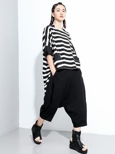 Sku CY-!63274 Material Cotton-blend , >50%Cotton Style Loose , Irregular clipping , Short Sleeves Feature Striped , Split-joint Neckline Round-neck Occasion Casual , Original Creation Seasons Summer Type T-Shirts Tops Color BLACK Size FREE SIZE Model's weight:50kg_ Model's height:170cmï¼66.93inches) Please consult the size chart we provide for this item's measurements to help you decide which size to buy.Please note: There may be 1-3cm differ due to manual measurement. INCH Upper Arm Circumference Bust Raglan Sleeve Length Sleeve Opening FREE SIZE 16.14 51.18 17.72 23.62-33.46 14.96 Baggy Black Crew Neck Top, Black Baggy Short Sleeve Tops, Black Baggy Tops For Spring, Baggy Black Casual Tops, Casual Black Baggy Tops, Black Casual Baggy Tops, Baggy Black Tops For Summer, Cotton Style, T Shirt Top