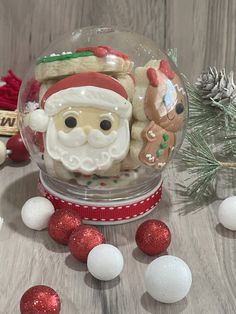 there is a snow globe with santa claus in it