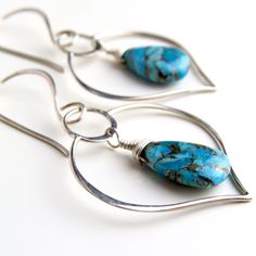 "Offered are my very elegant sterling silver and turquoise earrings! The turquoise is a very high grade Mojave turquoise that have \"been pressure stabilized, a bronze substance added to create the veining and color added to create the beautiful different colour hues.\" It's stunning! I coupled them with Balinese made sterling silver lotus leaf shaped components for a truly elegant and original pair of earrings! I have enough stones for ONLY THREE (3) PAIRS! These are so versatile - great for wo Turquoise Sterling Silver Pierced Earrings, Turquoise Sterling Silver Earrings With Ear Wire, Turquoise Earrings In Sterling Silver, Turquoise Sterling Silver Earrings For Pierced Ears, Turquoise Sterling Silver Pierced Jewelry, Pierced Turquoise Sterling Silver Jewelry, Turquoise Jewelry Earrings, Stainless Steel Bangles, Lotus Leaf