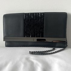 Brand New With Tags! Limited Edition Style. Black Vegan Leather Body With Beaded Panel On Front. Magnetic Snap Closure. Removable Gunmetal Chain Shoulder Strap. Interior Zip Pocket. 10.25l X 6”W X 1.5” D Chain Strap Drop Length: 13.5” Offers Welcome! Elegant Faux Leather Evening Clutch, Elegant Evening Faux Leather Clutch, Chic Evening Clutch In Faux Leather, Chic Faux Leather Evening Clutch, Chic Evening Faux Leather Clutch, Black Leather Clutch For Party, Black Leather Party Clutch, Black Leather Clutch For Night Out, Black Vegan