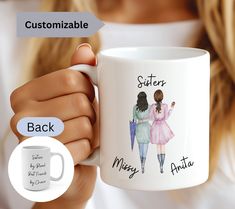 a woman holding a white coffee mug with the words sister and mary ann on it