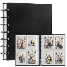 a black and white photo book with photos on it