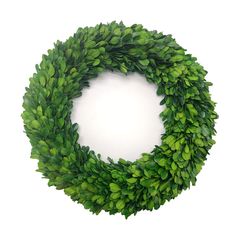 a green wreath on a white background with clippings to cut out the leaves