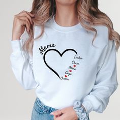 "Upgrade your mom style with our Personalized Mom Sweatshirt! It can be customized with your children's names for a unique touch to celebrate the special bond between mother and child. Whether it's Mother's Day, a birthday or just because, our customizable hoodie will make a thoughtful and heartfelt gift for any mom. With its comfortable fit, soft texture and customizable design, our sweatshirt/hoodie is a must-have in every mother's wardrobe. Treat yourself or surprise a mom friend with this pe Family Matching Letter Print Sweatshirt As Gift, Family Matching Sweatshirt With Letter Print As Gift, Family Matching Sweatshirt With Letter Print, White Crew Neck Top With Custom Name, Casual White Sweatshirt For Mother's Day, Personalized White Sweatshirt For Family Matching, Custom Name Tops For Mother's Day Gift, Casual Mother's Day Sweatshirt For Family, Casual Sweatshirt For Mother's Day Family Event