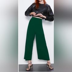 Brand New With Tags High-Waisted, Wide-Leg Forest Green Pants / Culottes By Zara. Side Zip. In Excellent Condition. Creases Are Due To Folding And Being Kept In A Storage Box. Smoke/Pet Free Home. Size: S Green High-waisted Wide Leg Pants For Fall, Green Bottoms With Elastic Waistband For Work, Green Elastic Waistband Bottoms For Workwear, Chic Green Bottoms With Elastic Waistband, Green Versatile Bottoms For Spring, Versatile Green Bottoms For Spring, Green Ankle-length Workwear Bottoms, Green Ankle-length Pants For Workwear, Green Ankle-length Pants For Work