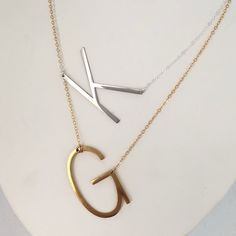 If you have a passion for fashion, this piece is for you! Big impact, minimal design and fashion forward styling. The Big Block Initial Necklace is a stand out piece for wearing and gifting. Show off your individual style with our Big Block Initial Necklace. Available in silver or gold plated initials. Chains are gold filled or sterling silver. Initial charms are approx 1.5 inches in size. This piece is ready to ship and leaves our studio in 1 to 3 business days. Modern Sterling Silver Monogram Jewelry, Gold Monogram Necklace In Trendy Style, Elegant Initials Necklace In Stainless Steel, Trendy Gold Monogram Necklace, Simple Gold Nickel-free Necklace, Elegant Initials Stainless Steel Necklace, Elegant Stainless Steel Initials Necklace, Minimalist Stainless Steel Necklace For Personalized Gifts, Modern Initial Pendant Jewelry For Everyday