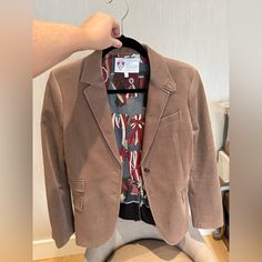 Brand New Never Worn!!!! Purchased At Gucci. Retail $2900. From The Equestrian Collection. Size : 44 Authentic Gucci Jacket In A Stunning Style. Tan Corduroy In A Cotton Blend. Suede Leather Trim At Elbow Patches. Blazer Riding Jacket Style With Single Button Front. Horn And Metal Logo Crest Buttons. Pockets At Waist. Lined In A Beautiful Silk Gucci Pattern . Made In Italy. Gucci Equestrian Collection. Perfect For Work Or Play. **Missing One Button In The Front, That’s Why The Price Is Super Low Chic Gucci Notch Lapel Blazer, Chic Gucci Blazer With Notch Lapel, Elegant Gucci Winter Blazer, Gucci Chic Single-breasted Blazer, Chic Gucci Single Breasted Blazer, Chic Gucci Single-breasted Blazer, Gucci Tailored Winter Blazer, Gucci Tailored Blazer For Winter, Tailored Gucci Winter Blazer