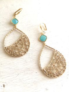 Turquoise Chandelier Earrings. Dangle Earrings. Statement Earrings. Jewelry Gift. Modern Fashion Drop Earrings. Chandelier Earrings Gift.  The gold pendants are are matte gold plated pewter and measure 30mm x 40mm. The faceted glass jewels are 8mm. The earrings dangle about 2. These earrings are fun and awesome!  Questions? Please dont hesitate to start a convo, wed love to hear from you!  *^*^*^*^*^*^*^*^*^*^*^*^*^*^*^*^*^*^*^*^*^*^*^*^*^*^*^*^*^*^*^*^*^*^*^*^* Thank you for visiting our sho... Elegant Turquoise Metal Chandelier Earrings, Elegant Turquoise Hoop Earrings, Elegant Turquoise Teardrop Earrings For Party, Turquoise Teardrop Earrings For Party, Elegant Turquoise Chandelier Drop Earrings, Turquoise Teardrop Chandelier Earrings For Pierced Ears, Elegant Turquoise Teardrop Pierced Earrings, Elegant Turquoise Dangle Chandelier Earrings, Turquoise Chandelier