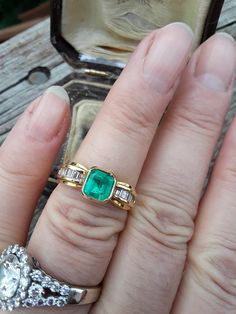 Beautiful 18k Yellow Gold, Approximately 1ct Cushion Cut Colombian Emerald, Diamond Baguette ring.. all sales are final. Weight is 5.5 Grams. Size 7 3/4.. Very Good Pre Owned Vintage Condition.. Ring Guard is NOT INCLUDED, just to show some ideas.. some pics ENLARGED to see details. Antique Box for Display only. Timeless Baguette Cut Emerald Ring For Anniversary, Yellow Gold Baguette Cut Emerald Ring For Formal Occasions, Elegant Emerald Ring With Baguette Diamonds For Formal Occasions, Classic Emerald Ring With Baguette Diamonds, Luxury Emerald Ring With Baguette Diamonds For Anniversary, Elegant Emerald Ring In Yellow Gold With Baguette Diamonds, Elegant Emerald Ring With Baguette Diamonds In Yellow Gold, Elegant Emerald Ring With Baguette Diamonds, Elegant Yellow Gold Emerald Ring With Baguette Diamonds