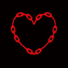 a heart made out of chains on a black background with the word love written in red