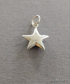 Limited edition sterling silver 5 point star charm measuring 15x15mm. Weight of charm is 1.12 grams. Every one of our findings undergoes a strict quality control process that ensures customer satisfaction. Perfect for bracelets or earrings. Use them in conjunction with our Snapeez Jump Rings The Ultra Secure | No Solder Jump Ring! Cute Silver Jewelry With Star Charm, Silver Star Charm Necklace, Silver Pendant Charm Necklace With Star Charm, Silver Pendant Charm Necklaces With Star Charm, Metal Star Charm Jewelry, Sterling Silver Star Charm Necklace Nickel Free, Silver Starfish Charm As Gift, Vintage Silver Jewelry With Star Charm, Personalized Silver Star Charm Necklace