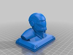 an image of a blue robot head on a stand