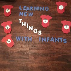 learning new things with infant's clothes made out of cutouts on the floor