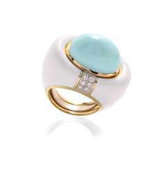 Cabochon turquoise, brilliant-cut diamonds, white enamel, 18K gold, and platinum. Luxury Blue Enamel Diamond Ring, White Enamel Rings With Polished Finish, Luxury Round Enamel Ring With Diamond Accents, Luxury Enamel Rings With Diamond Accents, White Gold Enamel Ring With Diamond Accents, White Enamel Elegant Rings, Luxury White Gold Diamond Enamel Ring, Luxury White Gold Enamel Diamond Ring, Luxury Turquoise Diamond Ring