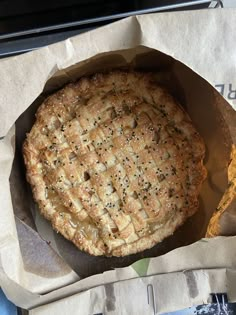 a pie sitting on top of a piece of wax paper