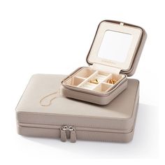 Keep your jewelry organized at home or on the go with this all-inclusive set of our bestselling Traveling Jewelry Cases. They feature linen-lined interiors packed with compartments to hold rings, earrings, bracelets and necklaces. Plus, the sleek faux leather exterior is perfect for monogramming for an extra a pop of personalized color.    Includes one small and one large Travel Jewelry Case.  Small: 4.5"w x 4.5 d x 2.25"h  Large: 9.75"l x 7.25"w x 2.25"h  Pebbled vegan leather with a soft linen Travel Tech Organizer, Jewelry Cases, Valentines Gift Guide, Organization Gifts, Mark And Graham, Travel Jewelry Case, Pets For Sale, Grad Gifts, Monogram Styles