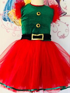 Christmas custom outfit for little girls - Christmas  Elf.Green velour top and  multi layered red skirt.Included dress, hat, socks  and gloves.Zipper and lacing  back.Colors: white, red, green, black, gold.Size 4-5 in stock  (chest 24 waist 22 length of dress 23-24).Can be made in  any size. Christmas Elf Dress, Yellow Pageant Dresses, Hot Pink Cocktails, Hot Pink Cocktail Dress, Christmas Elf Outfit, Elf Outfit, Girl Green Dress, Pageant Outfits, Dress Birthday Party