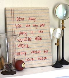 an image of a note that is posted on the wall next to a lamp and other items