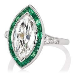 an emerald and diamond ring, by van cleef