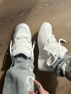 Sneak into style effortlessly with the timeless charm of Triple White sneakers! Bulky Shoes Men, Men’s Winter Shoes, Chunky Sneakers Outfit Men, Chuncky Shoes, White Sneakers Aesthetic, White Shoes Outfit Men, Chunky Shoes Men, Luxury Sneakers Men, Mens Sneakers Fashion