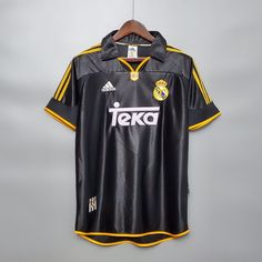 a soccer jersey hanging on a hanger