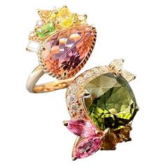 We handpick these stunning, beautiful green and pink tourmalines. Accompanied by brilliant yellow, green, and pink colored moissanite, this custom-designed twin gemstones statement ring is simply unique and one-of-a-kind. The fancy color burst of pink and green combination can easily match any outfit. Perfect for everyday wear. ◆ GEMSTONE: Natural Tourmalines, Colored Mossainites ◆ WEIGHT OF GREEN TOURMALINE: 2.81 Ct (Certified) ◆ WEIGHT OF PINK TOURMALINE: 1.345 Ct ◆ SIZE OF GREEN TOURMALINE: 8.3 x 8.3 mm ◆ SIZE OF PINK TOURMALINE: 9.8 x 6.5 mm ◆ ENHANCEMENT: No Treatment ◆ CLARITY OF TOURMALINE: Eye Clean ◆ BRILLIANCE OF TOURMALINE: GREAT ◆ PRECIOUS METAL: 14k Rose Gold ◆ WEIGHT OF GOLD: 4.59 g ◆ US Size: 6 (ship within 1 - 3 days) ◆Other sizes made to order (ship within 4 - 9 days) * Ge Colored Moissanite, Green Combination, Color Burst, Pink Tourmaline Ring, Tourmaline Crystal, Green And Pink, Precious Metal, Oils For Skin, Green Tourmaline