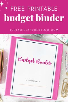 a pink binder with the text free printable budget binder on it, surrounded by office supplies