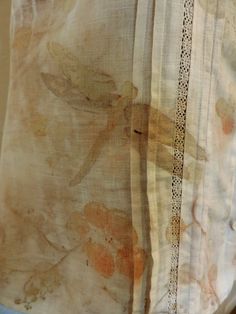 an image of a curtain that has been drawn with ink on it and is being held up by someone's hand