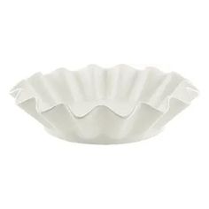 a white paper bowl with scalloped edges on a white background, the bottom is empty