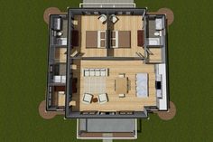 an aerial view of a small house with living room and dining area in the center