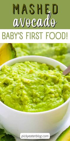 a white bowl filled with baby's first food mashed avocado