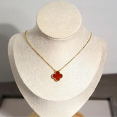 Red Clover Necklace Will Not Tarnish Trendy Red Pendant Necklace, Elegant Red Necklace With Clavicle Chain, Elegant Red Clavicle Chain Necklace, Elegant Red Clavicle Chain Jewelry, Trendy Red Round Jewelry, Red Clavicle Chain Jewelry For Valentine's Day, Red Clavicle Chain Necklace For Valentine's Day, Elegant Red Necklaces For Valentine's Day, Clover Leaf Necklace