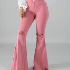 "Don't Make Me Blush" Is A High Waisted Bell Bottom Jean, Featuring Distressed Slits Across The Knees. Pink Western Outfits Women, Pink High Waist Ripped Bottoms, High Waist Ripped Pink Bottoms, Ripped Bottoms For Spring Party, Ripped Fitted Party Bottoms, High Rise Ripped Pink Bottoms, Pink Cotton Bottoms For Night Out, Pink Bell Bottoms Outfit, Pink Flare Pants Outfit