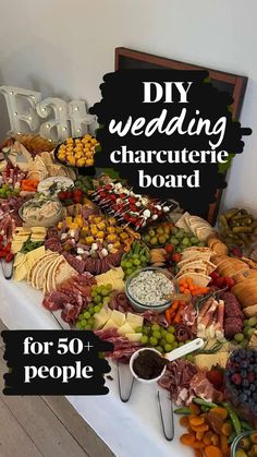 a table filled with lots of different types of food on top of it, and the words diy wedding charcute board for 50 people