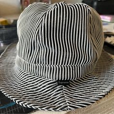 Black And White Mesh Fabric Size Small Never Worn Casual Striped Brimmed Hat, Black Cotton Sun Hat With Curved Brim, Black Brimmed Cotton Sun Hat, Black Cotton Brimmed Sun Hat, Striped Cotton Casual Hat, Casual Striped Bucket Hat With Curved Brim, Casual Striped Brimmed Bucket Hat, Casual Striped Short Brim Hat, Casual Striped Bucket Hat