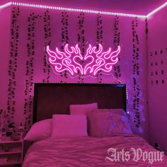 a bed room with a neatly made bed and lights