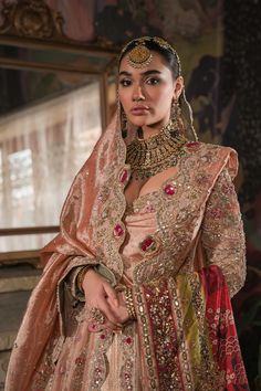 Royal Coral Peach Embroidered Pakistani Bridal Dress Lehenga Pishwas is paired with golden zardozi work and a hint of resham is majestic and stunning. The rich peach dupatta tissue adds an old-fashioned charm with its delicate border and resham knot ending with a delicate scalloped edge. Peach Dupatta, Dress Lehenga, Pakistani Bridal Dress, Peach And Gold, Zardozi Work, Pakistani Bridal Dresses, Pakistani Wedding Dresses, Pakistani Bridal Wear, Dresses Royal