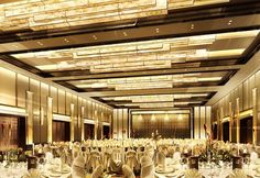 a large banquet hall with tables and chairs