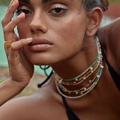 Our sell-out Bishnoi Choker has had a summery update this season. Dainty handcrafted coins hang from a chain of fun, rainbow  multi-coloured beads. Pair with silver layers and sandy toes for a perfect summer look. ~ Details ~ -Coin dimensions: 5mmLength: 32cm + 6cm adjuster -Material: Recycled sterling silver  - Multi-coloured glass beads. Due to its handmade nature the random selection of beads may differ slightly from the picture. ~ Social Impact ~ The Beach Bishnoi Choker has been carefully c Gold Coin Choker, Beach Beads, Resort Accessories, Coin Choker, Copper Mountain, Bead Choker, Versatile Jewelry, Rainbow Beads, Coloured Glass