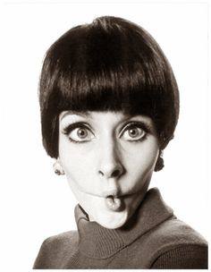 a woman making a funny face with her tongue out