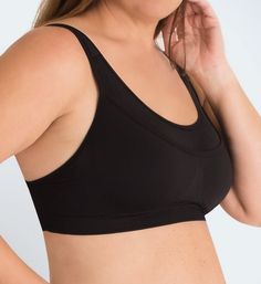 This medium impact sports bra features wide, padded straps that easily convert to a crossback and a seamless stretch fabric underband for comfortable support. Made from nylon and spandex. Wireless, seamless cups are unlined (unpadded). Front has double-layer seamless stretch fabric for better support and opacity. Key pocket at top left front. Breathable mesh front has a knit-in center triangle to separate breasts. Knit panels create encapsulation for a better fit. Full coverage neckline edges ha Supportive Stretch Bra With Breathable Material, Supportive Stretch Bra With Breathable Fabric, Supportive Stretch Bra With Breathability, Medium Support Full Coverage Workout Bra, Breathable Supportive Stretch Bra, Workout Bra With Medium Support And Full Coverage, Supportive Stretch Sports Bra With Light Support, Supportive Sports Bra With Light Support, Full Coverage Sports Bra For Workout