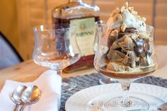 an ice cream sundae in a glass on a table