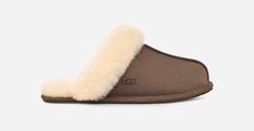 This essential house slipper is cast in soft suede and our signature sheepskin. Pair with our cozy robes or matching cashmere sets for maximal comfort. This product was made in a factory that supports women in our supply chain with the help of HERproject, a collaborative initiative that creates partnerships with brands like ours to empower and educate women in the workplace. This product contains real fur from sheep or lamb. Fur may be sourced from Australia, Ireland, the United Kingdom, or the Cozy Robes, Women In The Workplace, Ugg Scuffette, Sheepskin Slippers, Ugg Slippers, Woven Labels, House Shoes, Slipper Shoes, House Slippers