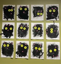 black cats with yellow eyes and pink noses are arranged in squares on a green wall