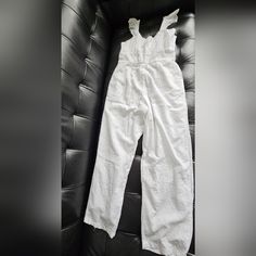 White Jumpsuit With Linen, Elastic In The Back And Side Pockets Size M New, Never Used With No Tag Summer Cotton Jumpsuits And Rompers For Daywear, Cotton Overalls For Daywear, White Cotton Jumpsuits And Rompers For Vacation, White Cotton Jumpsuits And Rompers For Beach, White Cotton Beach Jumpsuits And Rompers, White Overall Jumpsuits And Rompers For Loungewear, Sleeveless White Cotton Overalls, Chic White Cotton Jumpsuits And Rompers, Fitted Cotton Jumpsuit For Beach